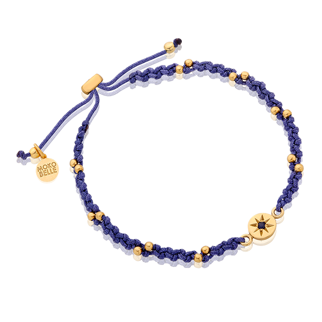 Blue braided bracelet with rosette