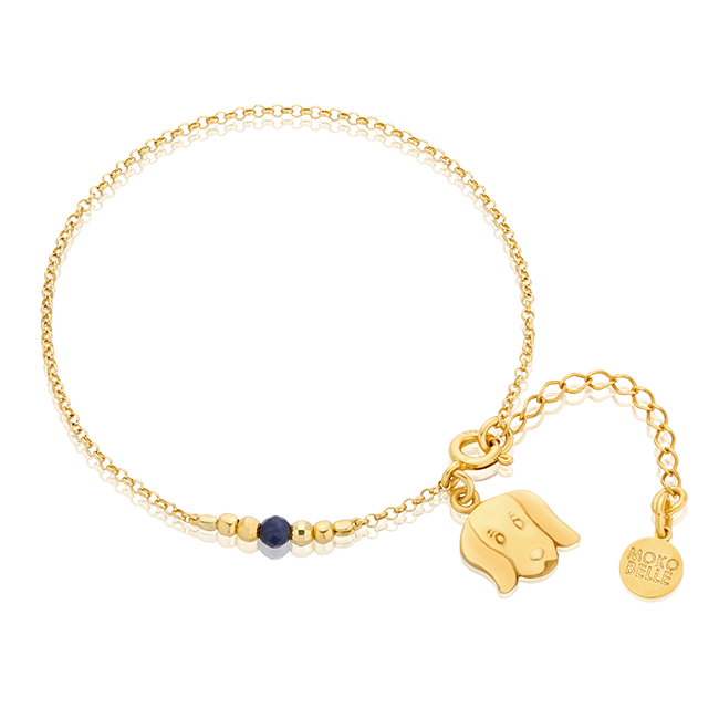 Chain bracelet with dog pendant and sapphire