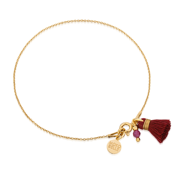 Bracelet with ruby stone and tassel